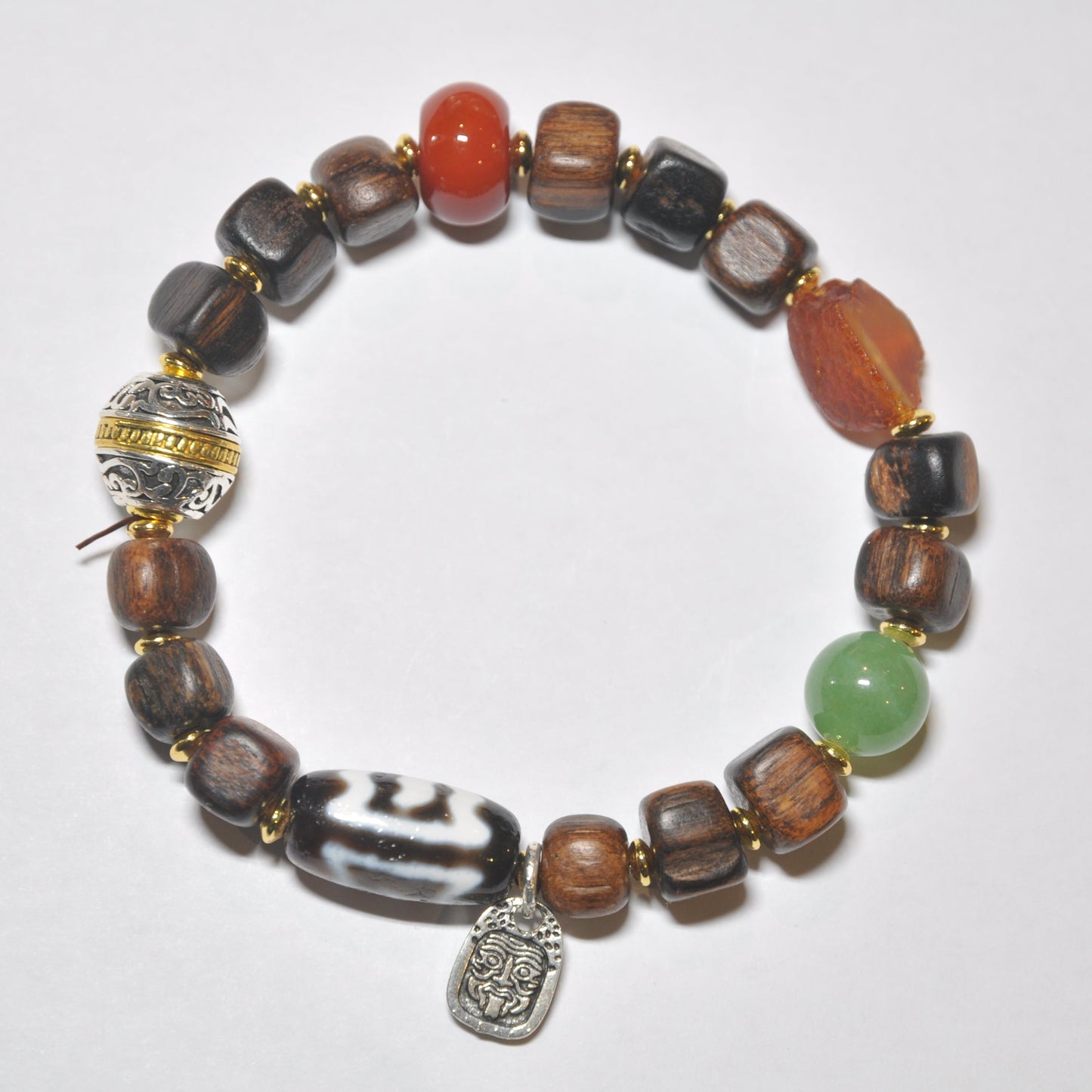 Wood Tibetan Charm